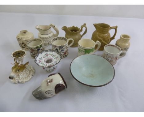 A quantity of hunting themed porcelain to include jugs, mugs and a stirrup cup in the form of a hunting dog (13)
