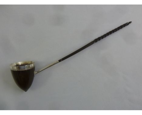 A George III ladle the coconut bowl with silver mounts and twisted whalebone handle, circa 1790