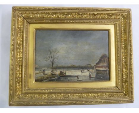 A framed oil on panel of a Dutch winter scene, 16.5 x 24cm
