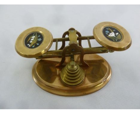 A set of brass postal scales set with pietra dura plaques and a full set of weights