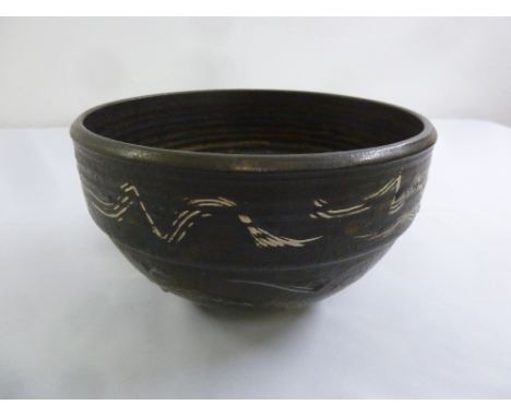 Muchelney studio pottery bowl in the style of John Leach, signed to the base