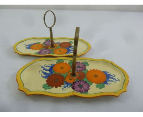 Clarice Cliff Bizarre two sandwich plates with silver plated carrying handles