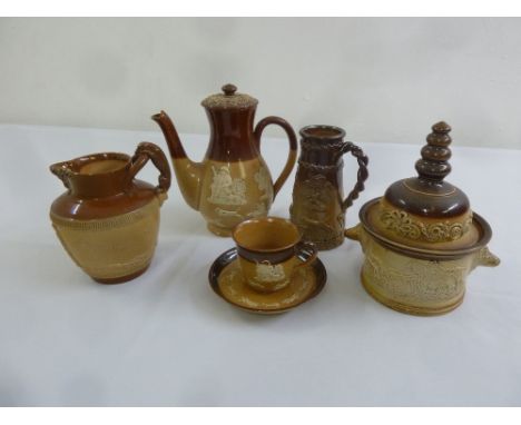 Doulton Lambethware tobacco jar, coffee pot, two jugs and a cup and saucers, all decorated with hunting scenes