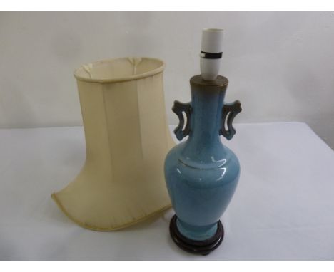 A Chinese blue ground two handled porcelain table lamp and shade