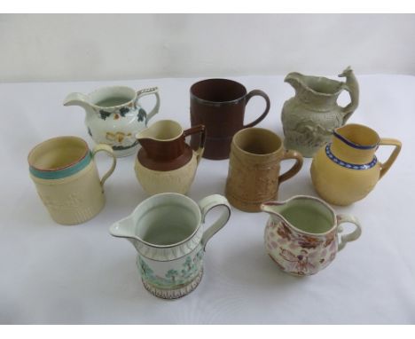 Nine ceramic jugs of various shape and size all with associated hunting scenes