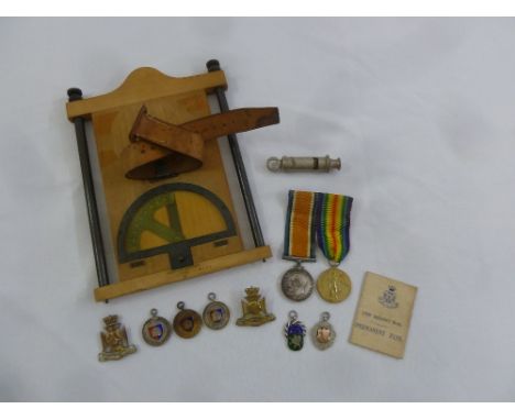 A quantity of Militaria to include medals and a compass holder