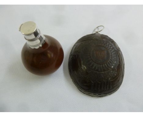 A late 18th century spice container in the form of a gourd with silver mounts and a late 18th century coconut cup carved with