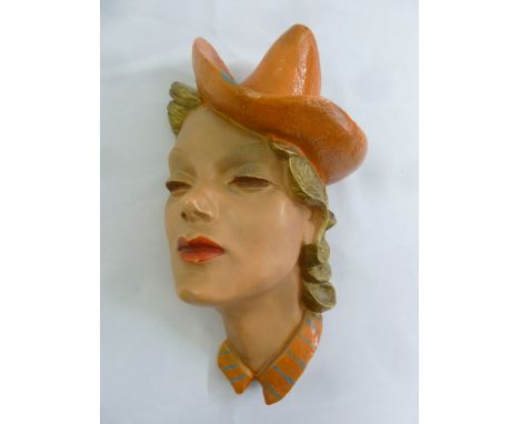 An Art Deco painted ceramic study of a lady, signed B. Collins to the base