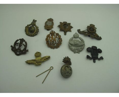 A Selection of British Army Cap Badges, to include Royal Tank Corps, Royal  Marine, Royal Artillery, etc (10)