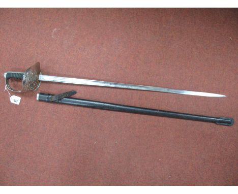 A British Army 1897 Pattern Sword, with EIIR Royal Cypher to guard and leather scabbard, manufactured by Wilkinson Sword.