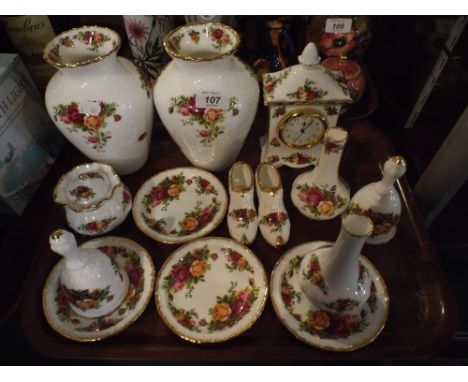 A Collection of Royal Albert Old Country Rose China to Include Vases, Mantle Clock, Pin Dishes, Bells Etc. 