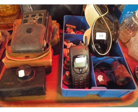 A Tray of Sundries to Include Cameras, Planter, Ornaments Etc.
