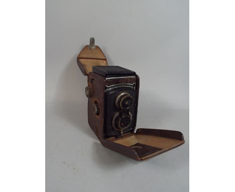 A Rolleicord Vintage Camera  with Compur Lens in Original Leather Case.