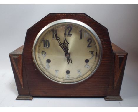 An Art Deco Oak Westminster Chime Mantle Clock.