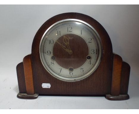 An Oak Westminster Chime Mantle Clock by Smiths.