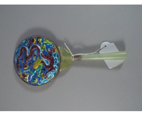 An Oriental Jade Handled Mirror with Coloured Enamel Decoration Depicting Dragon.