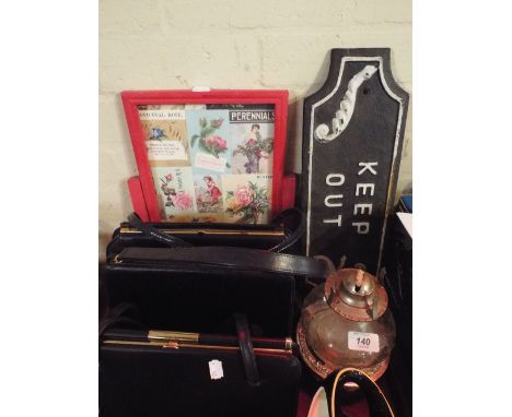 A Tray of Sundries to Include Three Ladies Handbags, Cast Iron Keep Out Sign, Oil Lamp Etc. 