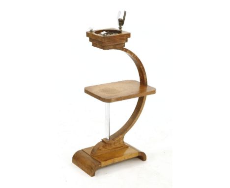 An Art Deco oak smoker's compendium table, 73cm high,a triform table stand, with a moulded circular top, 39cm high, anda chro