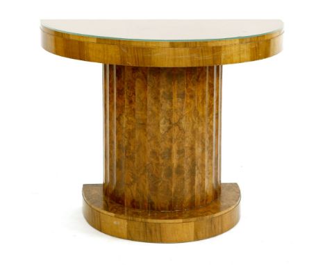 An Art Deco walnut console table,attributed to Epstein, the demi-lune top over a fluted column on a plain plinth, 92cm wide48