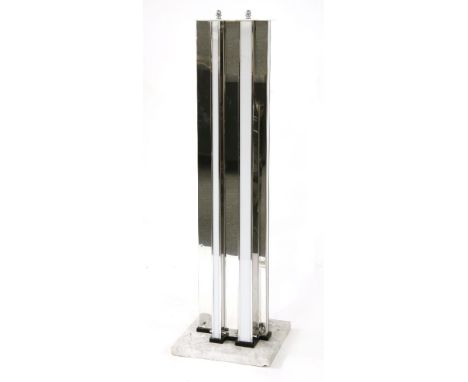 A chrome and Plexiglas floor lamp,1970s, raised on a marble plinth,134cm high