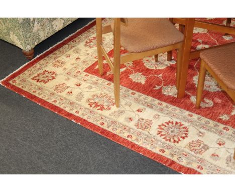 A large patterned carpet square