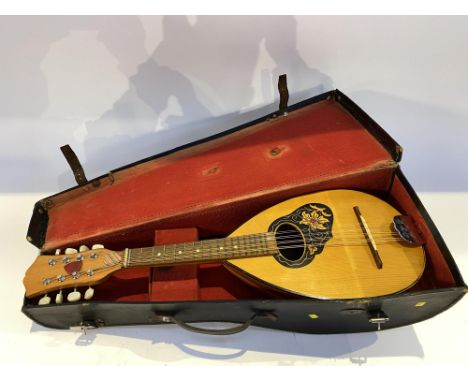 A Continental made mandolin, in leather case