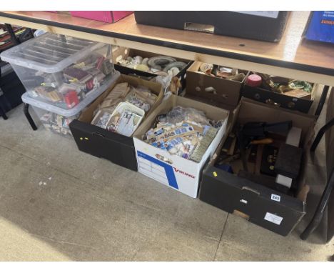 Two boxes of stamps, two boxes of matchboxes and cigarette boxes and a selection of vintage tools