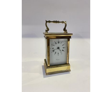 A 20th century Eurotime brass cased carriage clock with key, measuring 14cm H