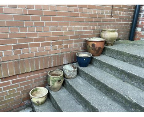 A small quantity of plant pots to include a strawberry planter, the largest measures 33cm H