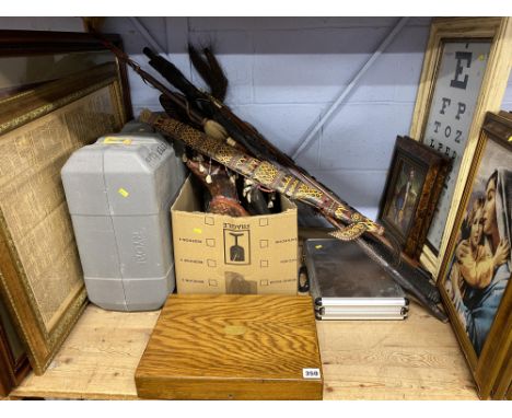 Tribal statues, framed pictures and a power tool