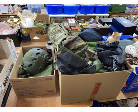 A selection of military equipment, including clothing, helmet, webbing and airsoft BBs