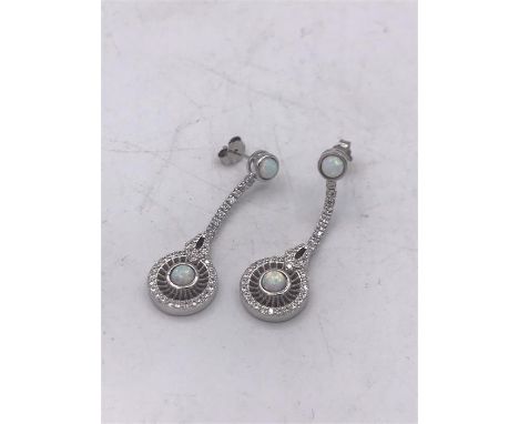 A pair of silver CZ and Opal panelled Art Deco style drop earrings