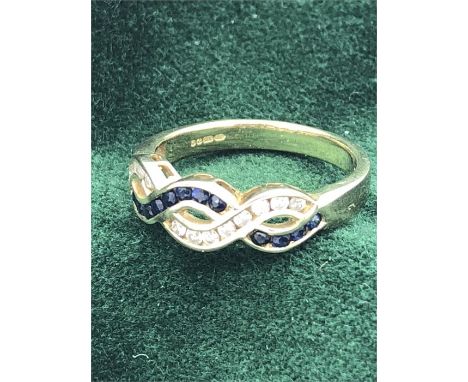 A 9ct diamond and sapphire ring 
