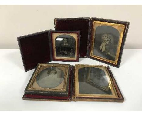 Three Victorian daguerreotypes and a miniature portrait of a lady 
