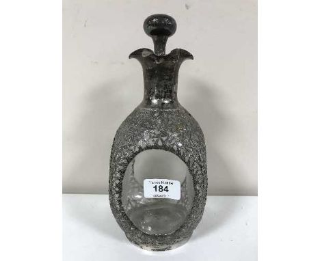 A Chinese silver mounted decanter and stopper, maker Lee Yee Hing, of dimpled square form, the silver mount with pierced bamb