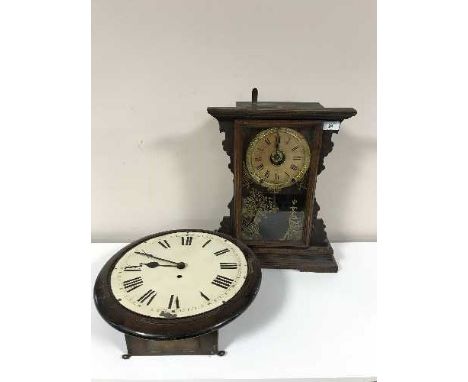 An early 20th century oak school clock and a pine cased American Seth Thomas mantel clock 