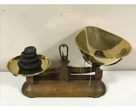 A set of vintage W. T & T. Avery kitchen scales with brass pans and weights 