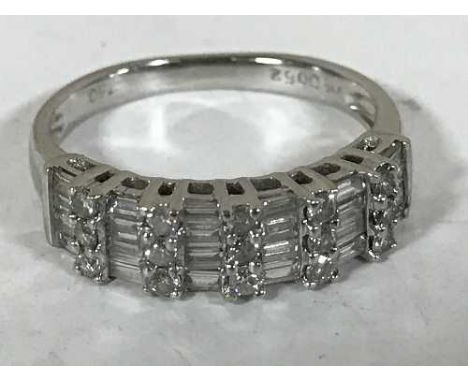 An 18ct white gold diamond set ring