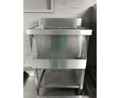 A stainless steel ice hopper 