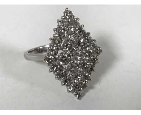 A diamond cluster ring, set with 29 brilliant-cut diamonds in a marquise setting, size P