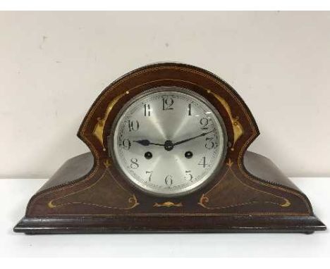 An inlaid mahogany mantel clock with pendulum and key 