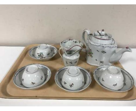A Newhall porcelain teapot and cover, circa 1790, of commode form, puce mark to underside, height 15cm, together with similar