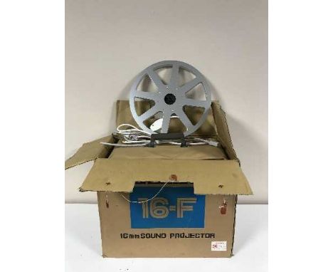 A boxed Elmo 16-F 16mm sound projector
