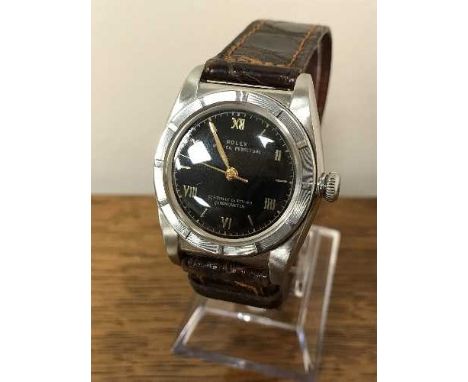 A Gents stainless steel Rolex Oyster Perpetual wristwatch, Officially Certified Chronometer, serial number 458722, on leather
