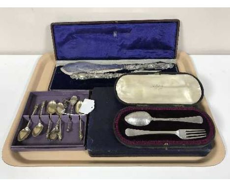 A cased silver fork and spoon, box of silver apostle spoons, cased fish servers and a cased vanity set (Q)