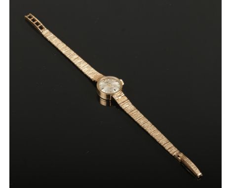 A ladies 9ct gold manual rotary wristwatch, 14.17g gross weight.  Working.