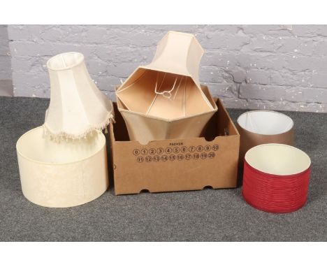 A box of assorted fabric light shades  