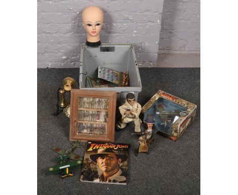 A box of collectables to include diecast planes, figures in display case, old telephone, mannequin head etc. Provenance Latho