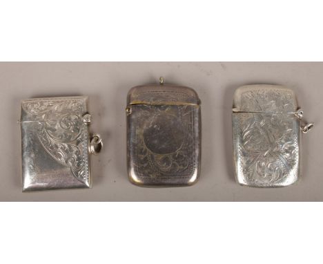 Three silver vesta cases to include include assayed Birmingham 1904 example etc, 75g.  