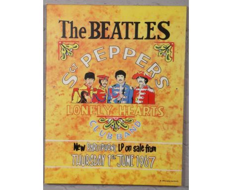 A reproduction Beatles advertising box canvas print. Originally for the release of th Sgt Peppers Lonely Hearts Club Band LP,